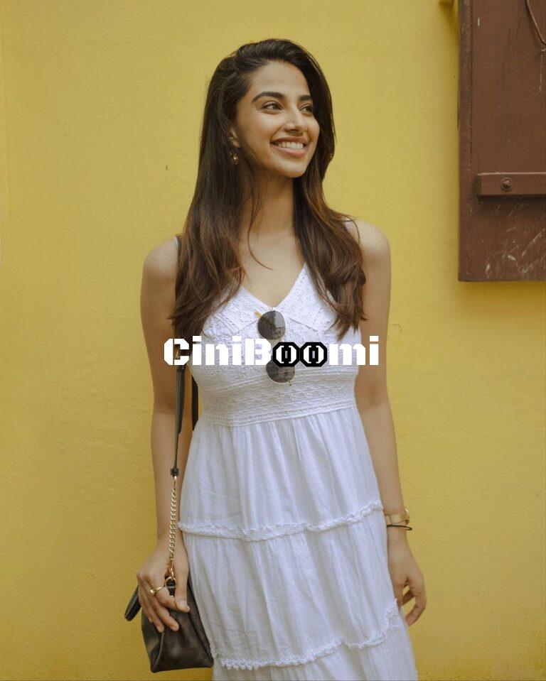 Actress Meenakshi Chaudhary Radiates Ethereal Beauty In White Outfit