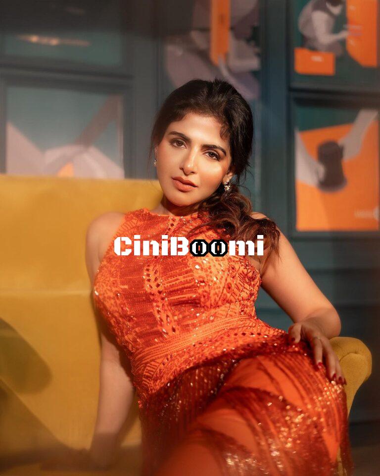 Actress Iswarya Menon Sparkles In Orange Outfit
