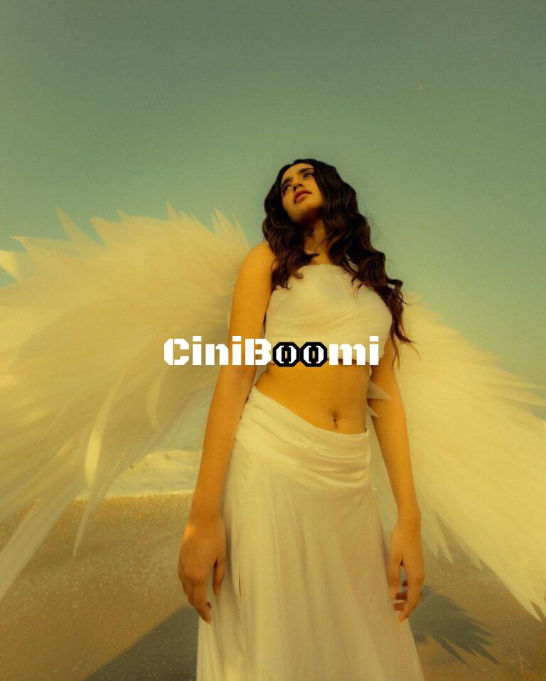 Actress Priya Varrier Exudes Angel Vibes In White Outfit