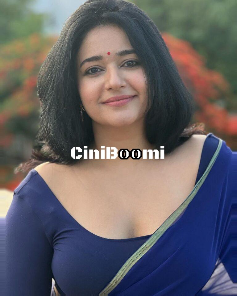 Actress Poonam Bajwa Sizzles In Blue Saree