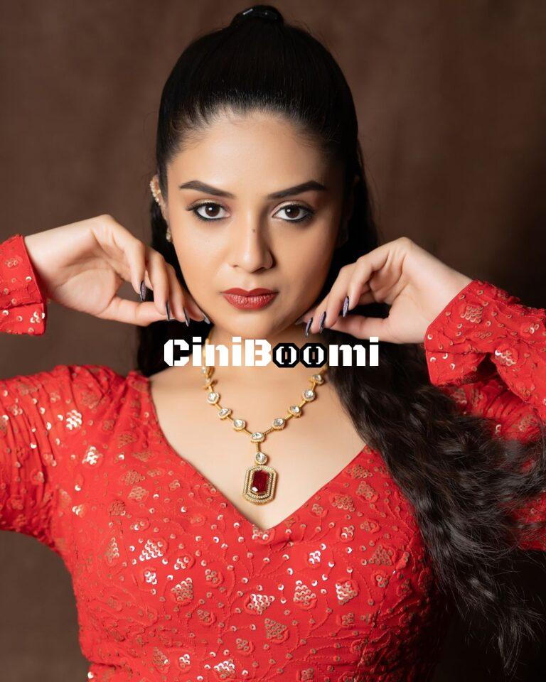 Actress Sreemukhi Oozes Style In Red Outfit