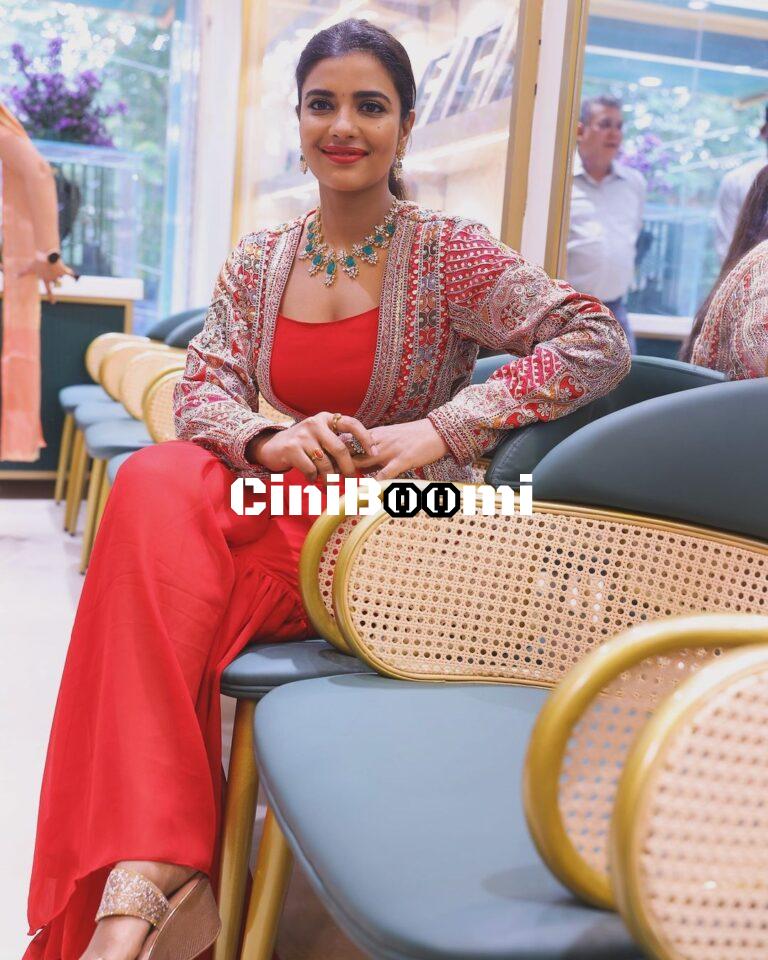 Actress Aishwarya Rajesh Exudes Elegance In Red Outfit