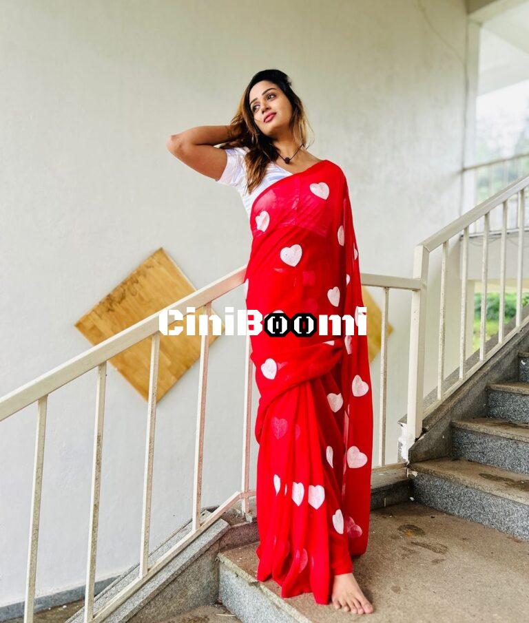 Actress Riya Vishwanathan Oozes Elegance In Red Saree