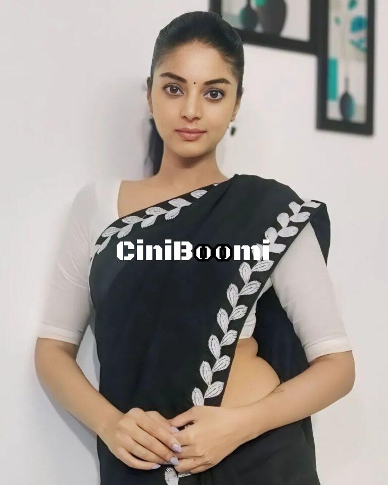Actress Sanam Shetty Oozes Charm In Black Saree